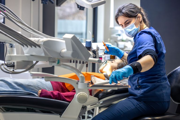 What does malpractice insurance typically cover for dentists