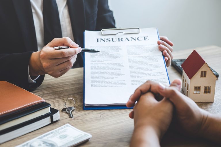 What factors influence malpractice insurance premiums